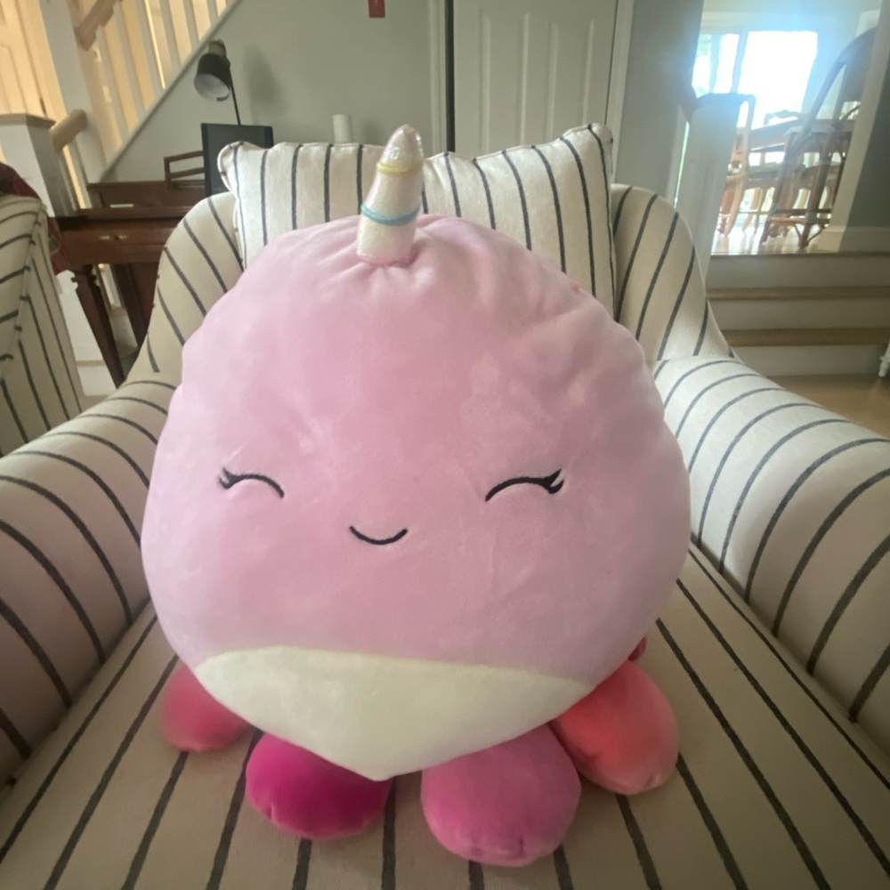 Narwhal squishmallow, different shades of pink and orange